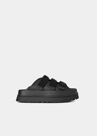 Sandales UGG Goldenglow Slide noir, vue de profil – mules plateforme femme | Ann Tuil