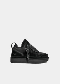 Sneakers UGG Lowmel en velours et fourrure noir, vue de profil – baskets fourrées femme | Ann Tuil