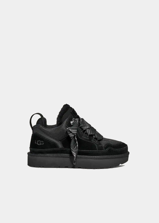Sneakers UGG Lowmel en velours et fourrure noir, vue de profil – baskets fourrées femme | Ann Tuil