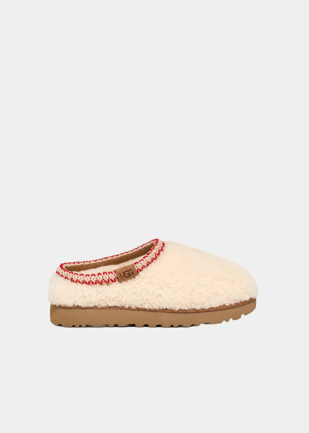 Mules UGG Tasman Maxi Curly coloris natural, vue de profil – chaussons mules fourrés femme | Ann Tuil